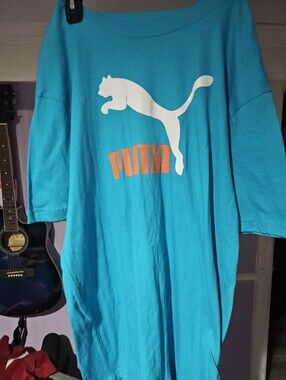 Puma Teal Tee with White Puma Logo and Orange Wordmark